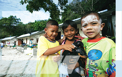 Children in front of relief housing in Phuket.